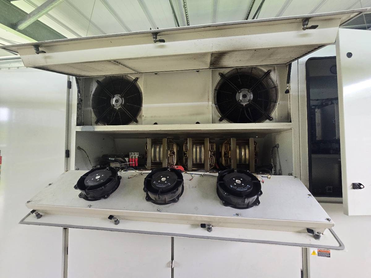 Central inverter opened for its annual inspection, fans and filters exposed